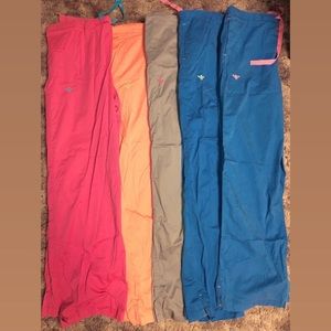 6 pairs of Med Couture Scrubs - size large